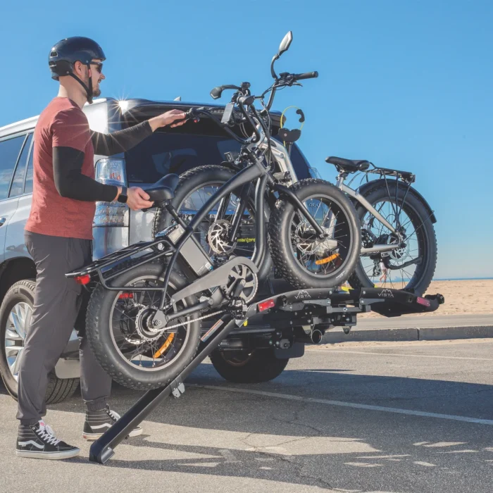 E-bike rack with loading ramp for easy transport of heavy bikes
